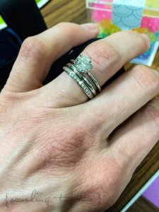 accordingtoame_bgdring_handshot_threerings.jpg