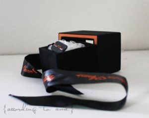 accordingtoame_bgdbox_unwrapped2_ring.jpg