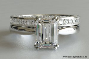 emerald-cut-engagement-ring-double-prong-platinum-princess-cut-band-large__2_0.jpg
