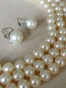 close_up_strand_and_earrings.jpg