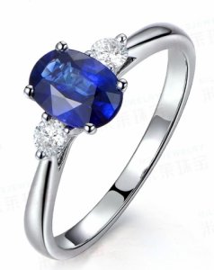 trilogy-half-carat-oval-cut-sapphire-and-round-diamond-engagement-ring-in-white-gold1.jpg