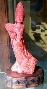 coral buddha with lotus.jpg