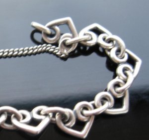heartcharmbraceletfromv3.JPG