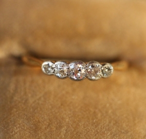 old_mine_5-stone_half_bezel.jpg