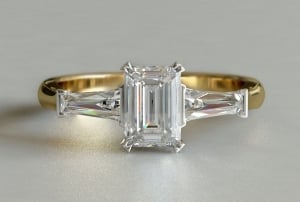 diamond-engagement-ring-emerald-cut-baguette-3-stone-yellow-gold-large.jpg