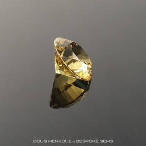 doug-menadue-bespoke-gems-australian-yellow-sapphire-round-brilliant-102746d-small.jpg