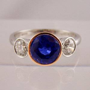 3 stone bezel.jpg