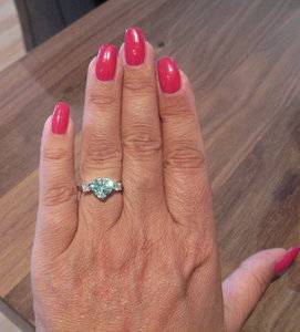 Paraiba Tourmaline Heart Ring on hand.jpg