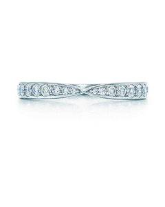Help me find a ring to layer my wedding band PriceScope