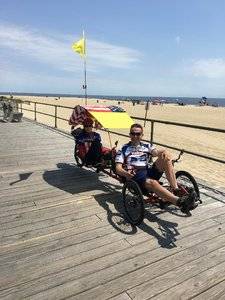 missyandgregbikewithcanopyboardwalk.jpg