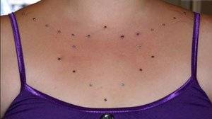 Chest-dermal-piercings.jpg