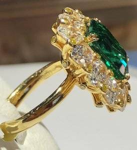 leibish-5-19-carats-emerald-halo-oval-diamonds-fancy-intense-yellow-radiant-ring-side-view.JPG