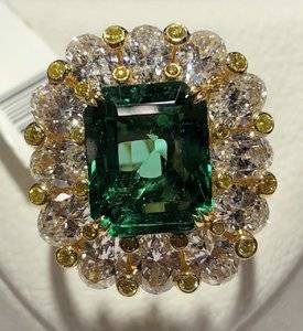 leibish-5-19-carats-emerald-halo-oval-diamonds-fancy-intense-yellow-radiant-ring-top-view.JPG