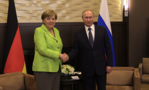 PutinHoldsHerHand.png