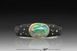 Hubble-Star-Pattern-Oval-Opal-Ring-18K-karat-yellow-gold-bezel-blackened-sterling-silver-1.jpg