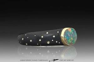Hubble-Star-Pattern-Oval-Opal-Ring-18K-karat-yellow-gold-bezel-blackened-sterling-silver-2.jpg