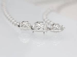 Side View-- 3 stone pendant.jpg