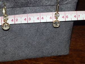gracedanglesnexttotapemeasure.jpg