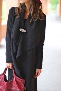 Use-a-brooch-as-a-closure-for-a-coat.jpg