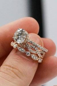 diamond-wedding-rings-pave-band-twisted-round-cut-diamond-jsdiamonds.jpg