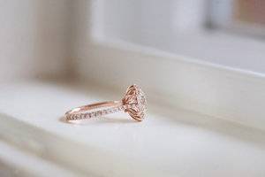 meg-rose-gold-diamond-halo-ring-3-jotw.jpg
