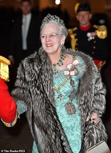 22886144-7843289-Queen_Margrethe_II_79_wore_a_floral_gown_in_aquamarine_and_a_sum-m-86_1577910...jpg