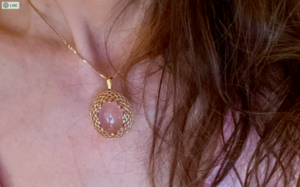 pinkquartznecklaceonneck.png