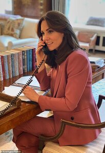 speaking on a telephone as she launches an initiative to support Britain's mental health durin...jpg