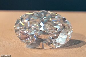 33009868-8718489-The_world_record_for_any_diamond_or_jewel_sold_at_auction_was_se-a-115_159975...jpg