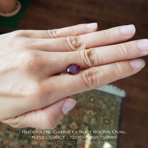 doug-menadue-bespoke-gems-raspberry-pink-red-rhodolite-garnet-supernova-oval-1252p.jpg