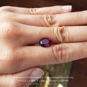 doug-menadue-bespoke-gems-raspberry-pink-red-rhodolite-garnet-supernova-oval-1252s.jpg