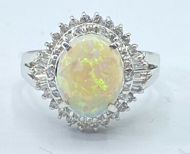 Opal diamond platinum ring.jpg