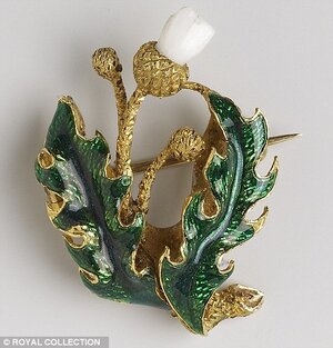q-victorias-tooth-brooch.jpg
