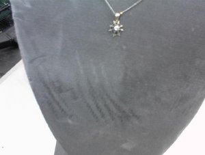 Closeup diamond in the web pendant.jpg