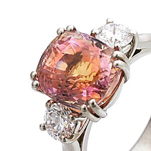 Platinum Padparadscha Sapphire and Diamond Trilogy Ring.jpg