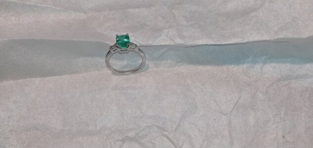 platinum 950 ,1.5 cts untreated colombian emerald with two side diamond side stone..jpg