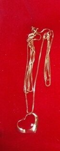 open heart pendant with diamond on yellow gold box chain.JPG