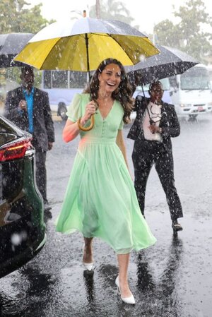 catherine-duchess-of-cambridge-arrives-in-the-rain-for-a-news-photo-1648239245.jpg