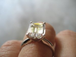 ring glinting yellow on finger.jpg