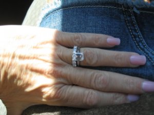 hand on denim with ec and band.jpg