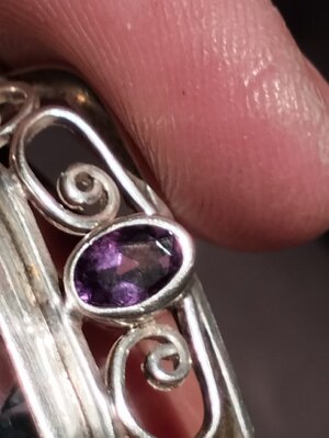 Face Purple stone before clean.jpg