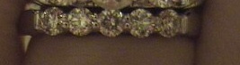 my new diamond band is the bottom ring (2).jpg