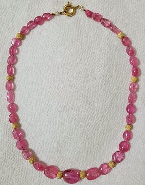 Pink tourmaline and gold beaded necklace.jpg