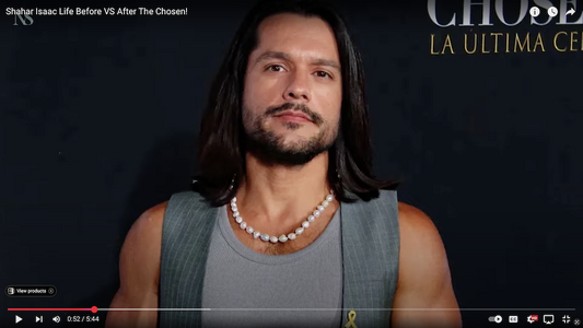 Shahar Isaac wearing pearls.png