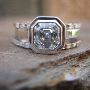 LaurenThePartier's 3 ring Asscher set