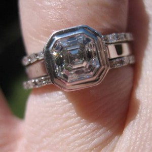 LaurenThePartier's 3 ring Asscher set