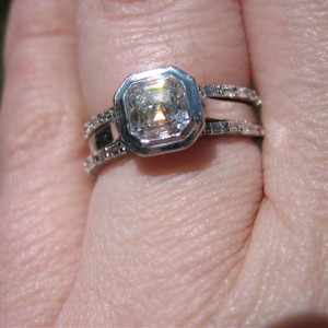 LaurenThePartier's 3 ring Asscher set