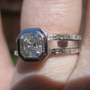 LaurenThePartier's 3 ring Asscher set