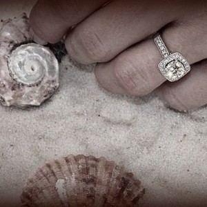 Round diamond in cushio shape halo