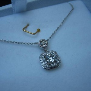 LTP's .46 ct. OEC pendant with bezel set .20 ct. OMC